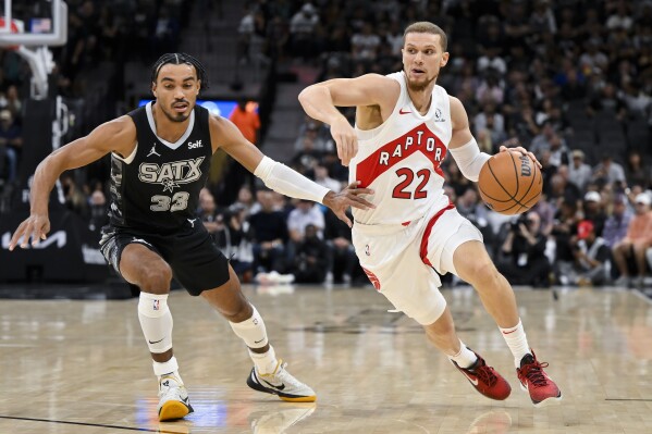 Raptors overcome 22 point deficit beat Spurs 123 116 in OT AP News